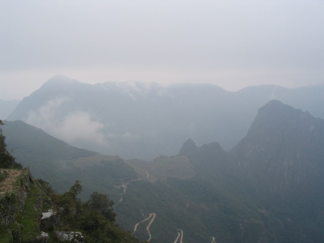 Machu Picchu emerging from the fog
